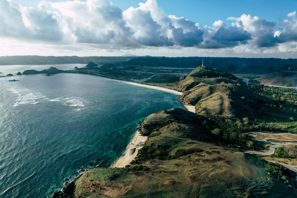 An aerial view of an island in the middle of the ocean
